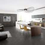 Die neu gestaltete Insel der Küche Concrete integriert einen Esstisch in Form einer seitlich auskragenden  Platte. Eine elegante und kompakte Lösung.