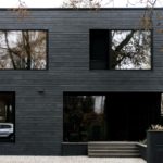 Dachabdichtung mit Bitumen Schwarze Haus, Fassade