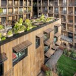 Die Planer von AAVP entwarfen ein Holzgebäude für Wohnen und Gewerbe in Paris, mit vielen Gemeinschaftsflächen und Gärten auf dem Dach.