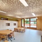 Die neue Grundschule in Howald, beeindruckt mit Architektur und den weitgespannten Holzdecken aus Flächenelementen von Lignatur.